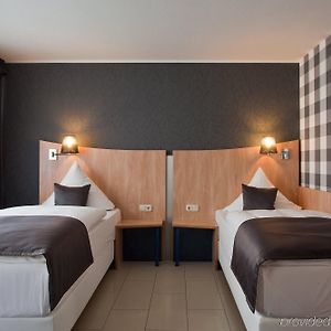 Kamer met een Queen Size Bed